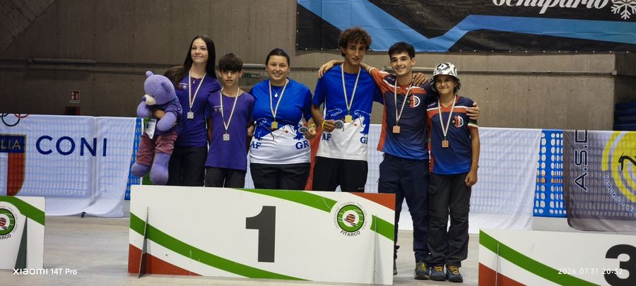podio squadra mixed team