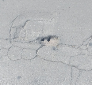 Il tombino asfaltato